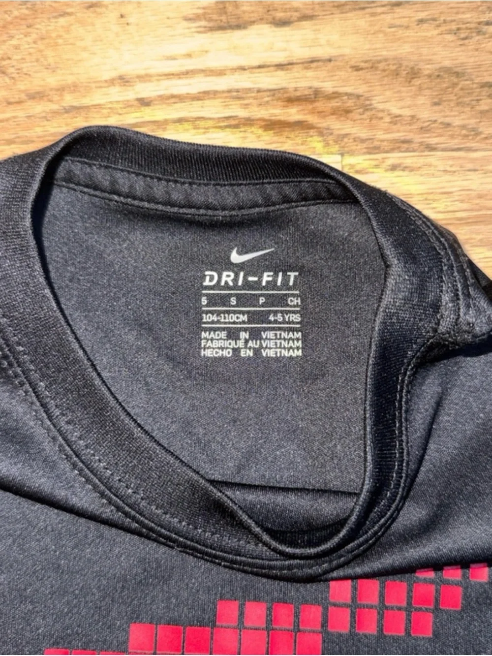 Nike Black Short-Sleeve Dri-FIT Tee with Red Pixel Swoosh